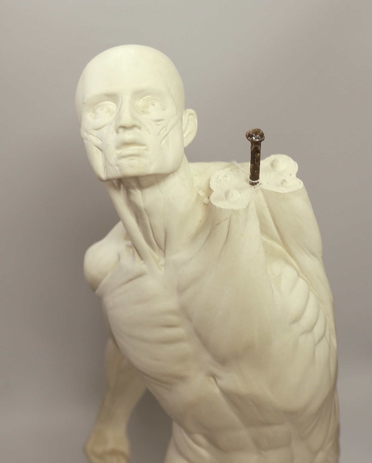 A plaster Echore model, 60cm high (left arm damaged)